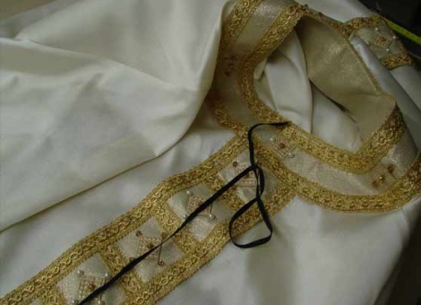 casula bianca solenne controllo